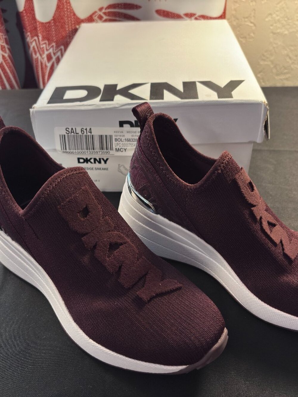 New in box! DKNY Keeva Wedge Sneaker in Wine Size 5.5